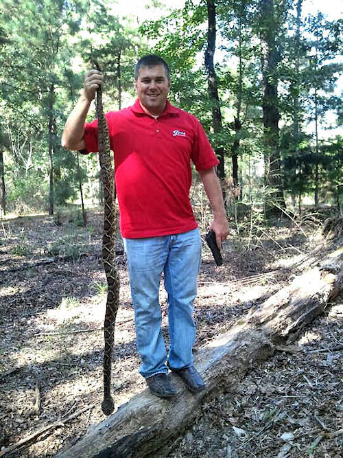Chris Wallace with rattlesnake