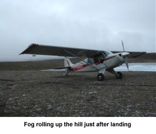 Fog rolling up the hill just after landing